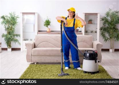 The old female contractor doing housework. Old female contractor doing housework