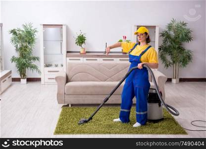 The old female contractor doing housework. Old female contractor doing housework