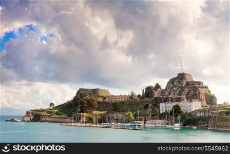 The Old Fortress of Corfu Town, Greece. Built by the Venetians it is still used for cultural events though some walls are eroding into the sea (left side).