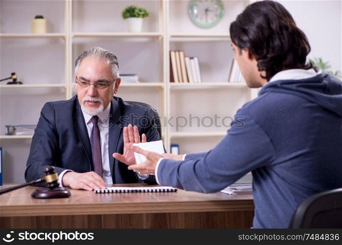 The old male lawyer in corruption concept . Old male lawyer in corruption concept