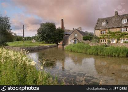 The old mill at Lower Slaughter near Bourton on the Water, Gloucestershire, England.