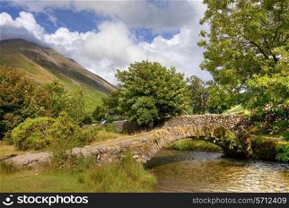 The old packhorse bridge at Wasdale Head near Wast Water, the Lake District, Cumbria, England.