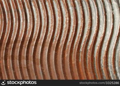The old rusty metal washboard as texture