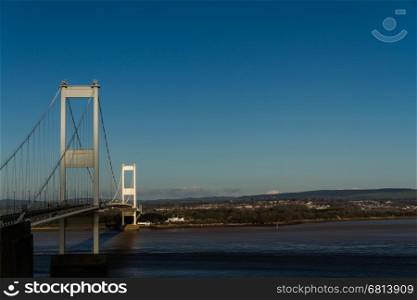 The old Severn Crossing welsh Pont Hafren bridge that crosses from England to Wales across the rivers Severn and Wye. Space to right.