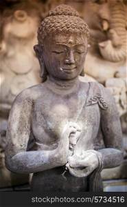 The old stone Buddha statue. Indonesia, Bali.&#xA;