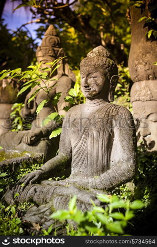 The old stone Buddha statue. Indonesia, Bali.&#xA;