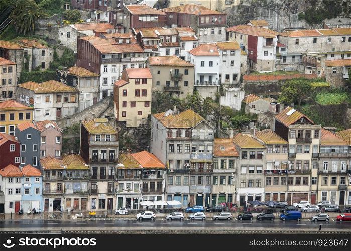 the old town by rainshower on the Douro River in Ribeira in the city centre of Porto in Porugal in Europe. Portugal, Porto, April, 2019. EUROPE PORTUGAL PORTO RIBEIRA