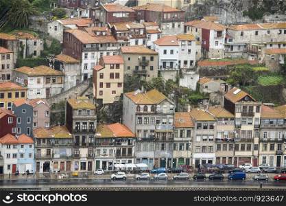 the old town by rainshower on the Douro River in Ribeira in the city centre of Porto in Porugal in Europe. Portugal, Porto, April, 2019. EUROPE PORTUGAL PORTO RIBEIRA