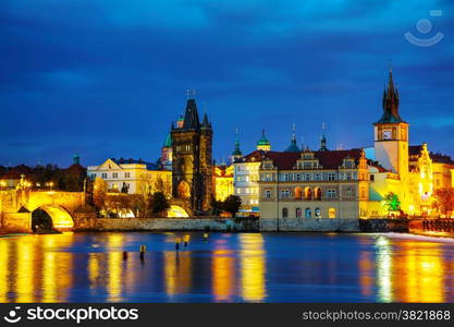 The Old Town Charles bridge tower in Prague in the evening