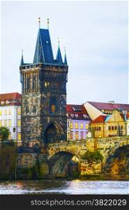 The Old Town Charles bridge tower in Prague in the evening