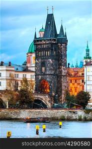 The Old Town Charles bridge tower in Prague in the evening