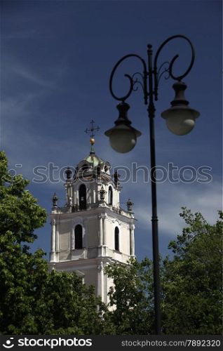 The old Town of the City Vilnius with a church and the Johanneschurch in the Baltic State of Lithuania,