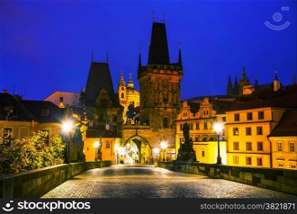 The Old Town with Charles bridge in Prague before sunrise