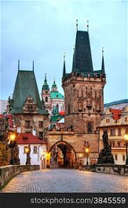 The Old Town with Charles bridge in Prague early in the morning