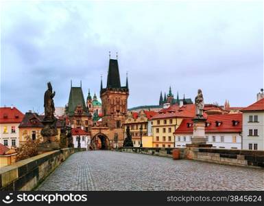 The Old Town with Charles bridge in Prague early in the morning