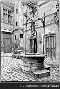 The old well of the court entrance, vintage engraved illustration. Paris - Auguste VITU ? 1890.
