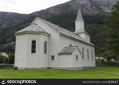The old white church with tower in Odda