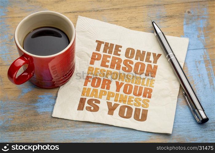 The only person responsible for your happiness is you - word abstract on a napkin with a cup of coffee