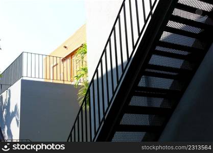 the outdoor black steel stairs install out side building