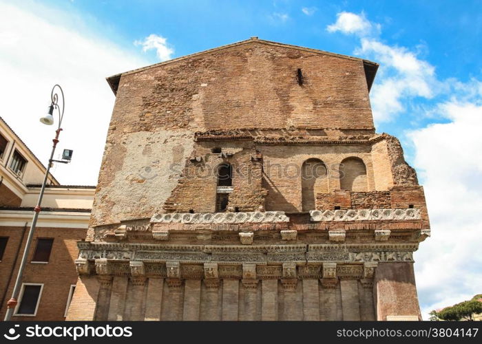 The outer wall of an ancient building in Rome, Italy