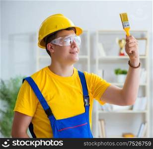 The painter working at home in refurbishment project. Painter working at home in refurbishment project