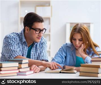 The pair of students studying for university exams. Pair of students studying for university exams