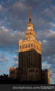 The Palace of Culture and Science in Warsaw Poland was donated by Stalin in 1955. Picture taken as the sun is setting.