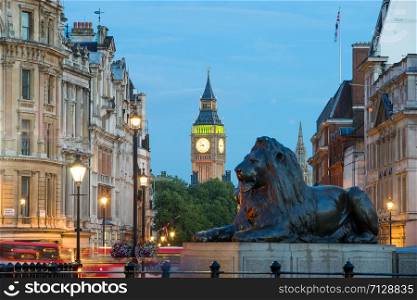 The Palace of Westminster Big Ben & Trafalgar square at night, London, England, UK