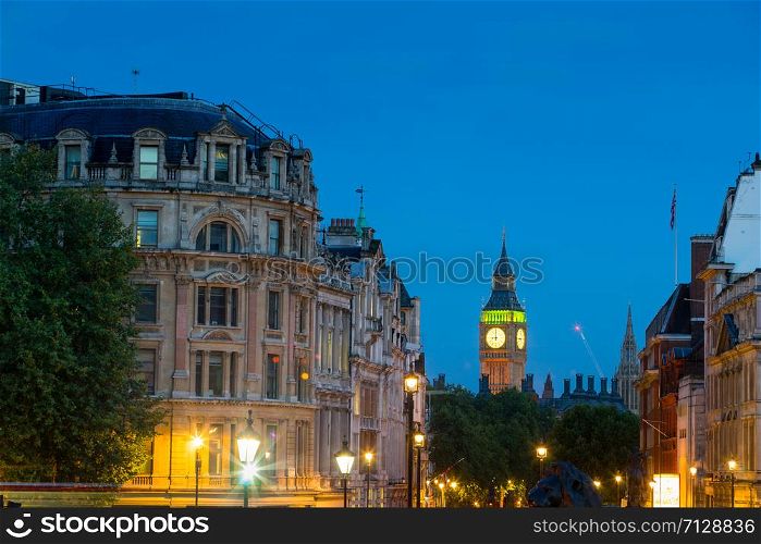 The Palace of Westminster Big Ben & Trafalgar square at night, London, England, UK