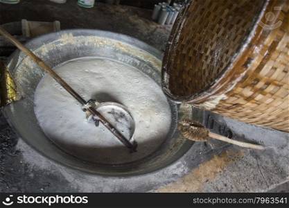 The Palm sugar production at a Plantation in the Town of Tha Kha in the Province Samut Songkhram west of the city of Bangkok in Thailand in Southeastasia.. ASIA THAILAND SAMUT SONGKHRAM PALM SUGAR