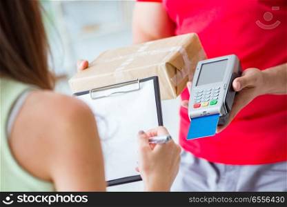 The parcel delivery being paid with pos and credit card. Parcel delivery being paid with pos and credit card