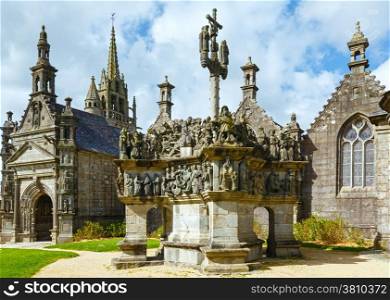 The parish of Guimiliau dedicated to St. Milio and dating 16-17 century. Brittany, France. Spring view.