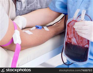The patient getting blood transfusion in hospital clinic. Patient getting blood transfusion in hospital clinic