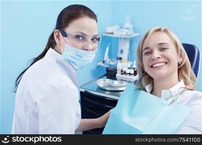 The patient on examination by a doctor in a dental clinic