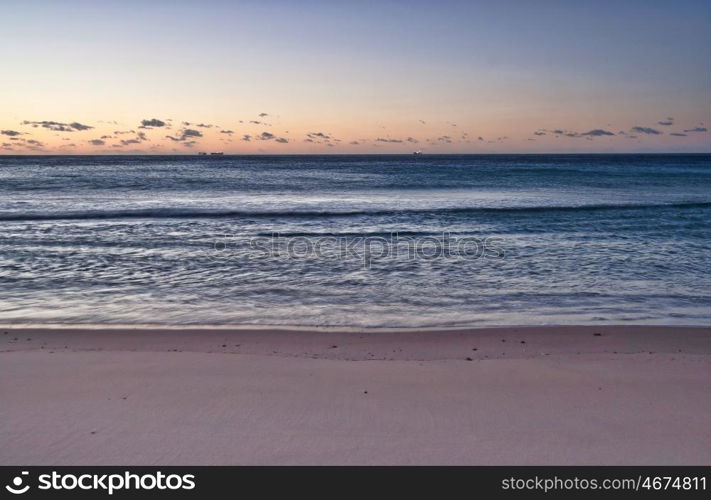 the peaceful beach at wollongong at sunrise