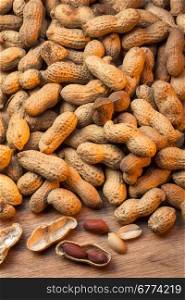 The peanut, or groundnut (Arachis hypogaea), is the seed of a tropical South American plant, often roasted and salted and eaten as a snack or used to make oil or animal feed. A plant of the pea family bears the peanuts, which develop in pods that ripen underground.