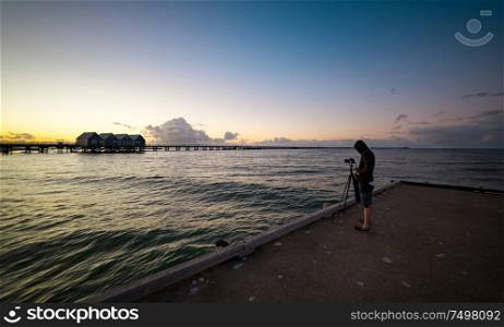 The photographers in the shooting sunset on Busselton jetty, Western Australia