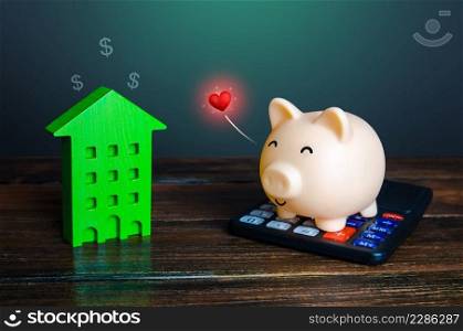 The piggy bank is happy to save on home bills. Save money on utilities and high energy efficiency. Housing green technologies. Autonomy and self-sufficiency. Carbon negative, low emissions.