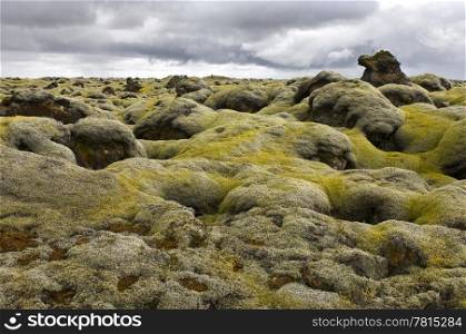 The pillow-like tops of the moss covered lava fields near Kirkjubaerjarklaustur in the south of Iceland, with its peculiar shapes, the aftermath of the 1783 volcanic eruption of the Laki Volcano
