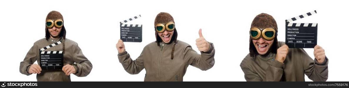 The pilot holding movie clapboard on white. Pilot holding movie clapboard on white