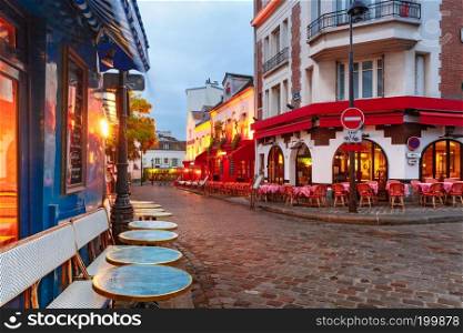 The Place du Tertre with tables of cafe in the morning, quarter Montmartre in Paris, France. Montmartre in Paris, France