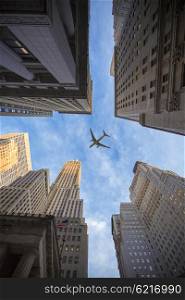 the plane flies over the city over New York