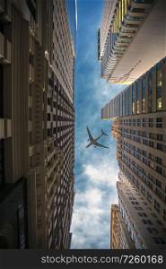 the plane flies over the city over New York