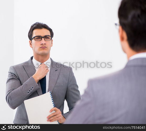 The politician planning speach in front of mirror. Politician planning speach in front of mirror