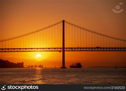 the Ponte 25 de Abril or 25the April Bridge at the Rio Tejo near the City of Lisbon in Portugal. Portugal, Lisbon, October, 2021