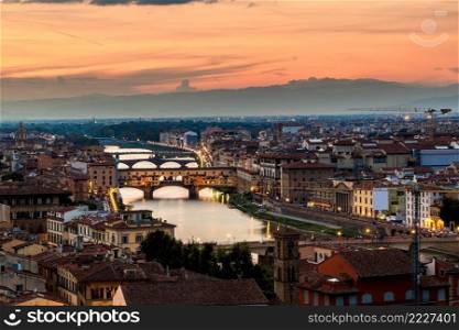 The Ponte Vecchio at sunset in Florence, Italy