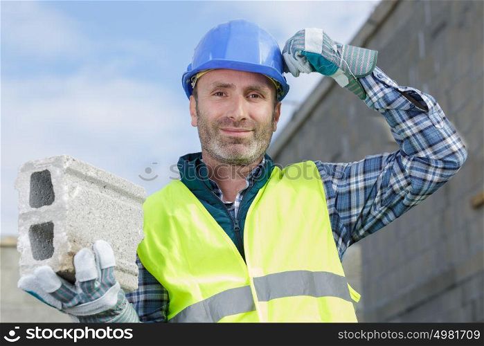the portrait of a bricklayer