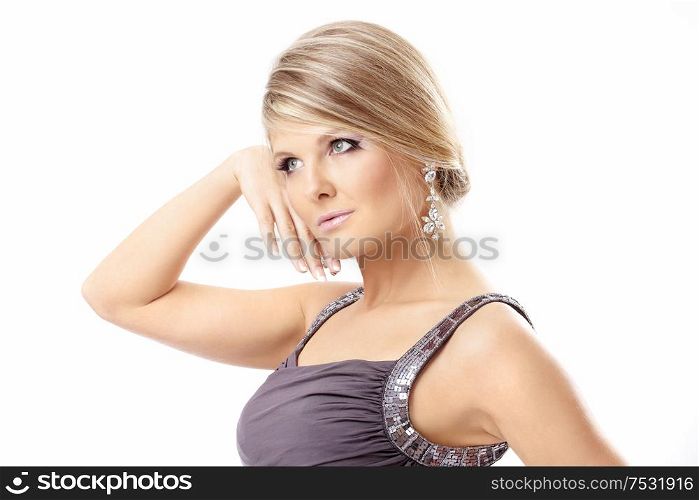 The portrait of the charming blonde isolated on a white background
