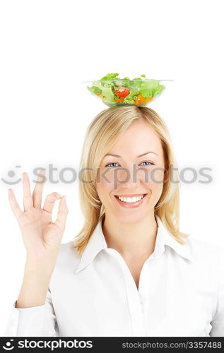 The positive girl with a salad dish on a head, isolated