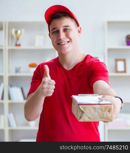 The post man delivering a parcel package. Post man delivering a parcel package